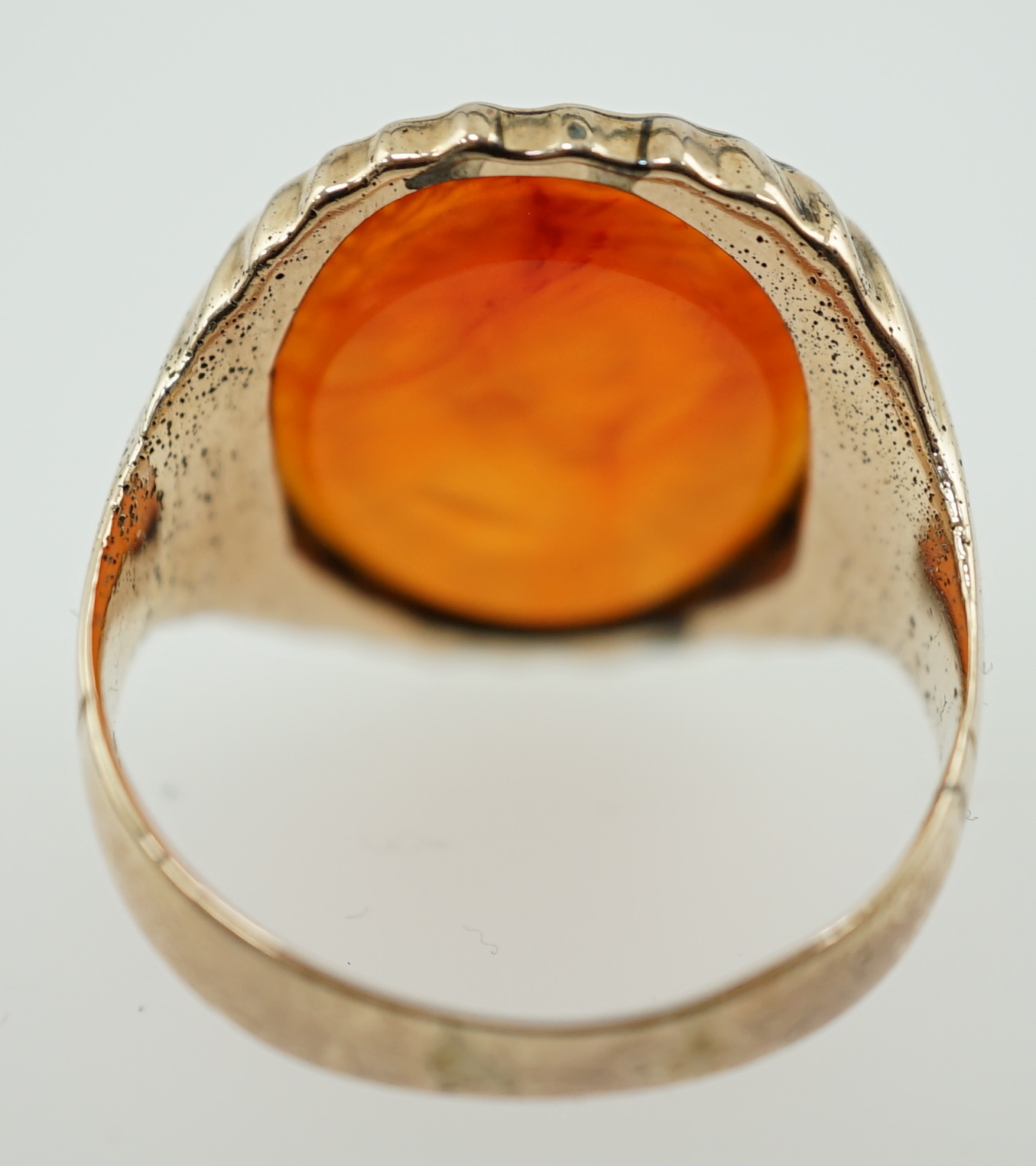 An antique Austro Hungarian gold and carnelian intaglio set oval ring, carved with the bust to dexter of Arch Duke Joseph